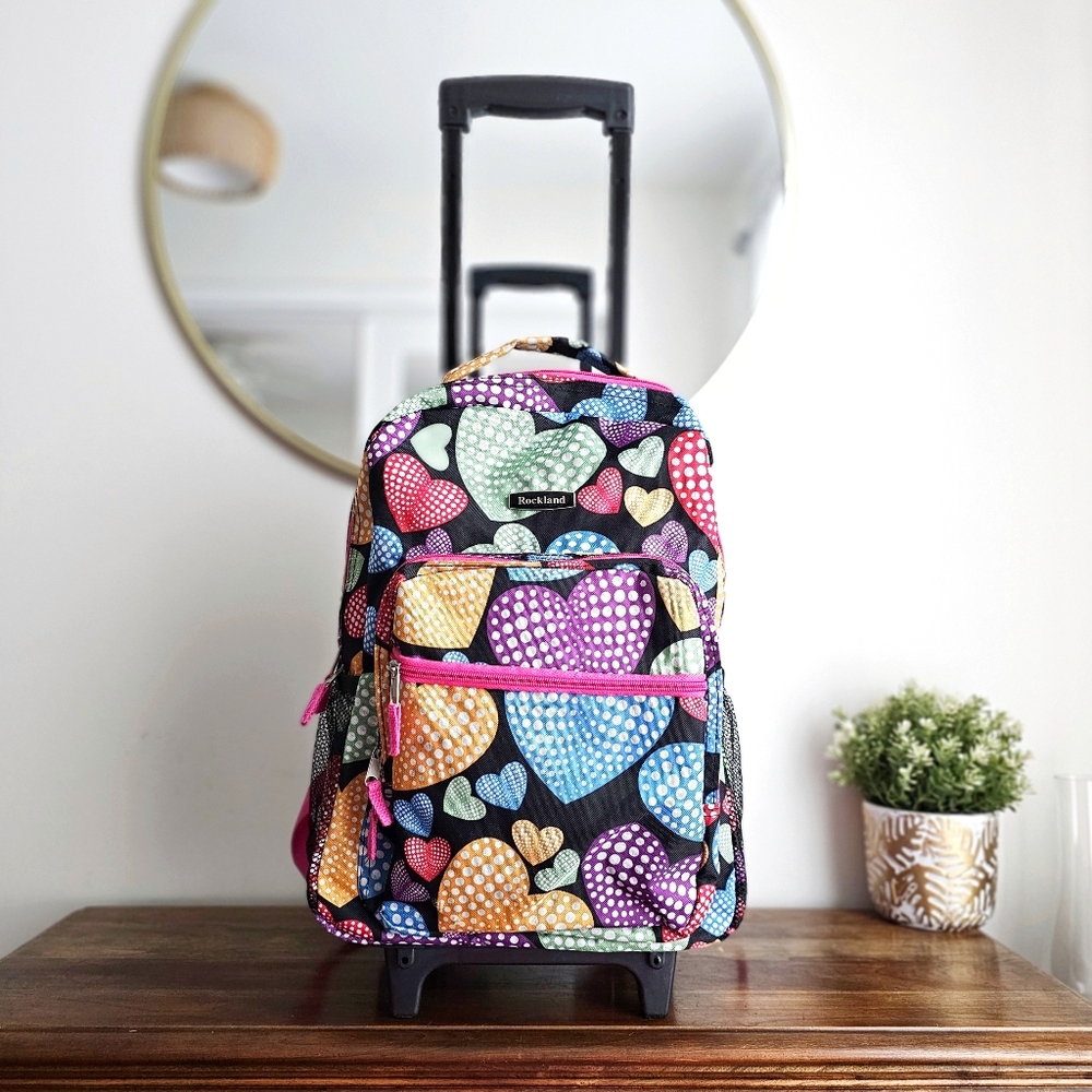 Rockland Rolling Backpack School Bag Travel Luggage Mesh Pockets New Heart 17″